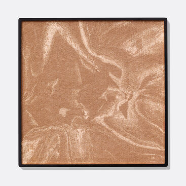 Limited-edition Mary Kay Illuminating Bronzer in shade Medium Glow against plain background